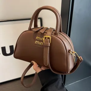 Crossbody Bag on One Shoulder and Half Round Shell Bag on Hand