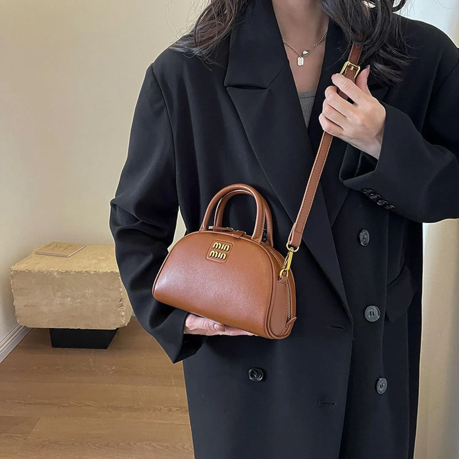Crossbody Bag on One Shoulder and Half Round Shell Bag on Hand