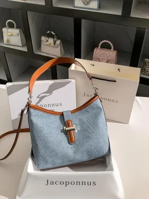 Genuine leather denim blue hobo bag female 2024 new bag light luxury senior sense of niche commuter Tote bag